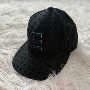 Vintage Etnies 59Fifty fitted hat with an all-over print